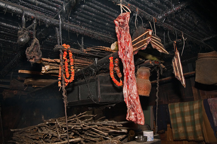  Smoking the meat above the fire place   Apatani house